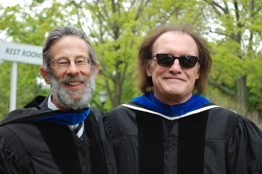 Commencement day featuring Professors Berry and Devigne