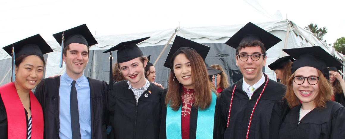 Students in cap and gown on Commencement Day