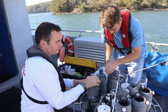 Students participate in marine science research on a boat