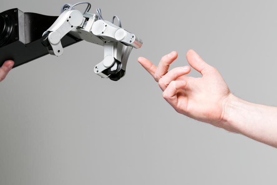 Robot touching hand