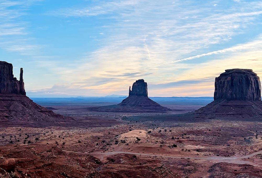 Photograph titled "Sunrise at Monument Valley"