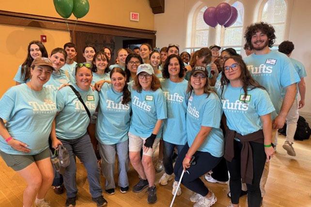 Several people posing for a group photo