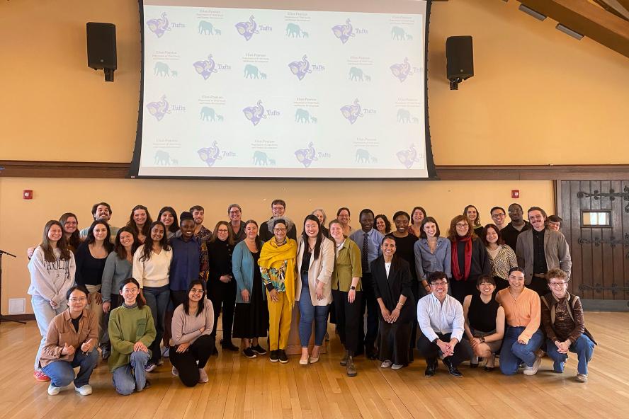 Several people posing for a group photo