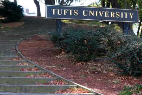 Tufts sign next to stairs