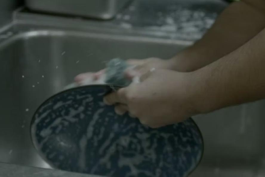 Person washing dishes