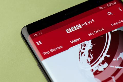 Mobile phone displaying the BBC News website