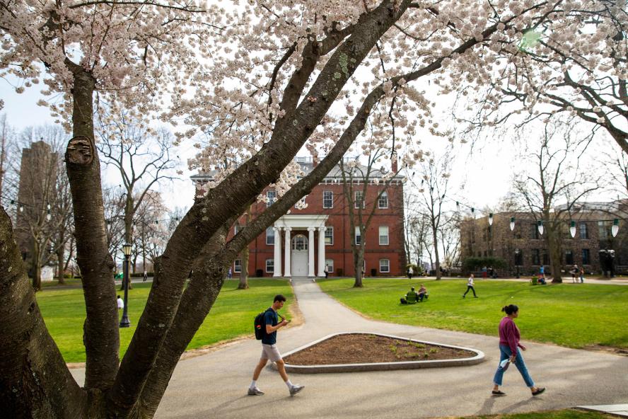 Students walking on Tufts quad
