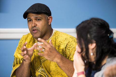 Silas Pinto speaking to a class