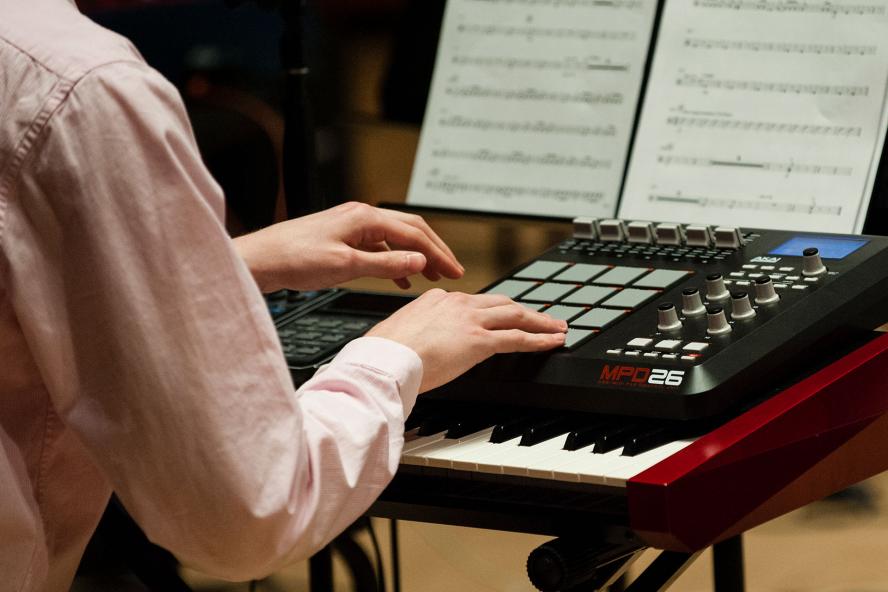 A Tufts student performs on a Moog synthesizer in the Electronic Music Ensemble.