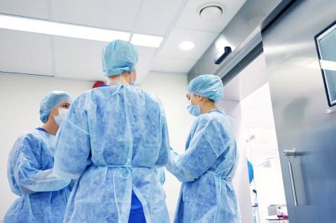 Keren Ladin and two other people in operating room
