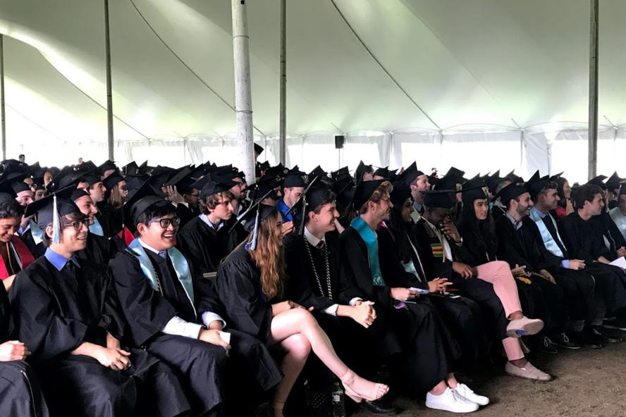 Commencement day featuring Political Science students sitting
