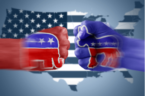 Two fists displaying democrat and republican