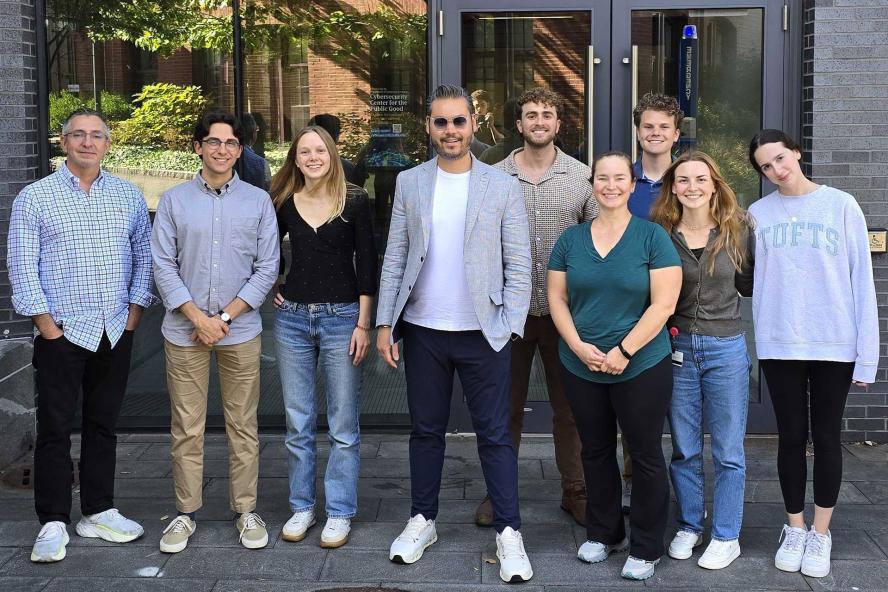 Team members in front of the Science and Engineering Complex
