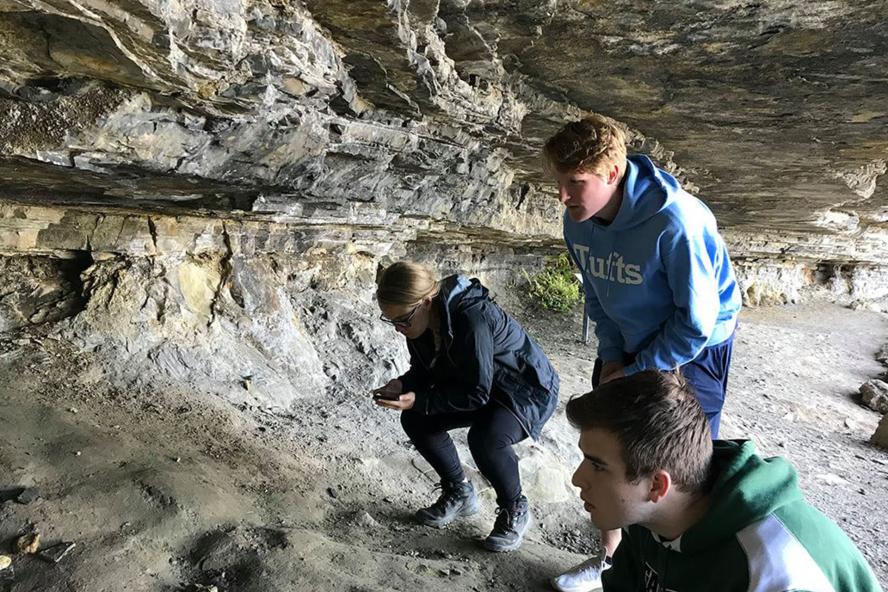 Tufts students studying rock formations