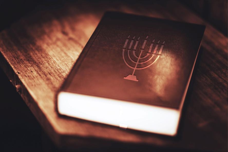 Torah book on table
