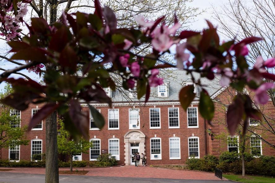 Braker Hall surrounded by red trees