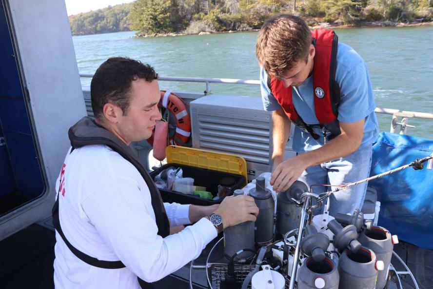 student and instructor on boat