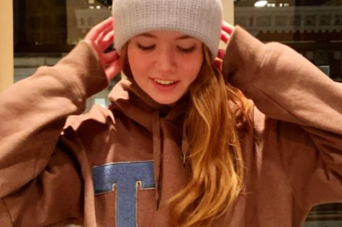 Eloise Burke, with the T from the letter sweater belonging to her grandfather, John Melling, A70, D77