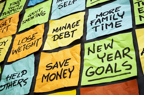 photographed of new year goals and resolutions on colorful sticky notes