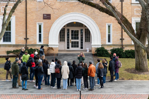 A crowd of parents and students listen to a tour guide talk on the Tufts Medford/Somerville campus. Out of the more than 34,000 applications, students in the admitted Tufts Class of 2027 bring engagement, academic excellence, and diversity