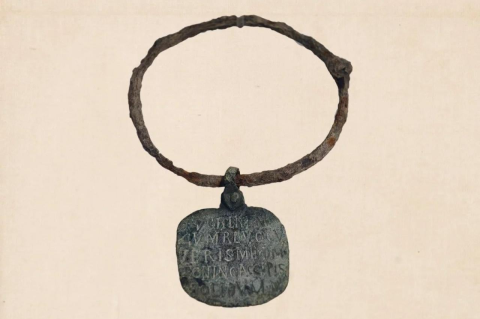 A very old looking iron collar with a round disk attached to it, with writing in Latin. In the ancient Near East and classical Greece and Rome, slavery was pervasive, discriminatory, and cruel, and definitely not “beneficial,” says an expert