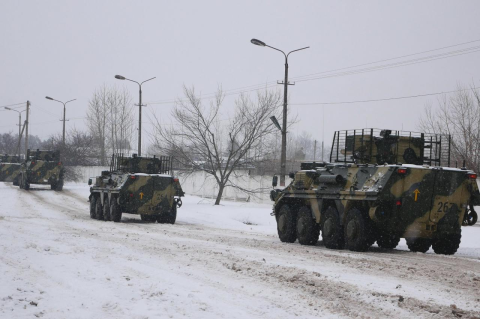 Armored personnel carriers on a snowy road in the countryside. In a new book, Tufts political scientist Oxana Shevel describes the internal politics and external divisions that contributed to the current war between Russia and Ukraine