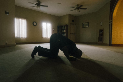 Muslim man bowing for prayer