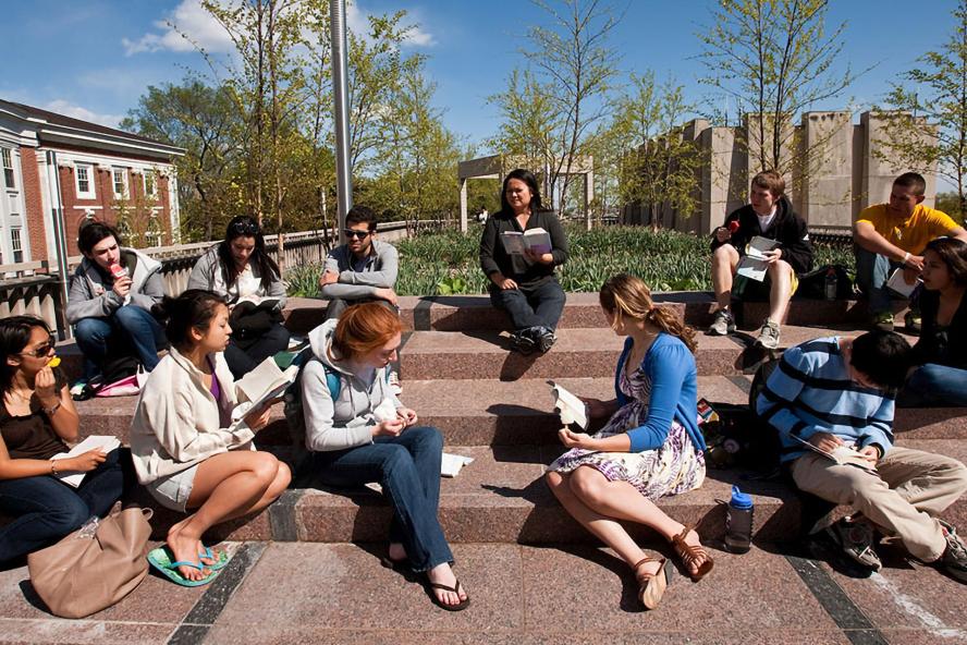 Students sitting on the Tisch Library roof