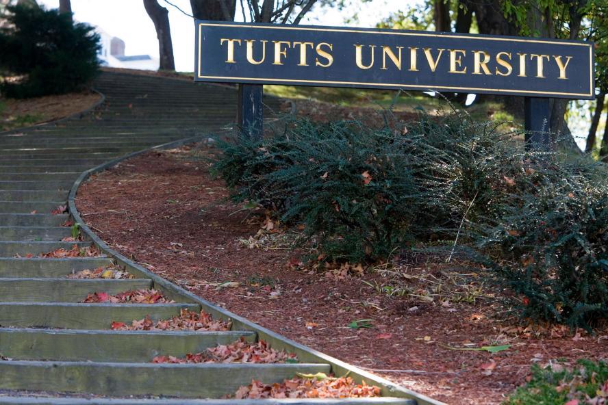 Tufts sign next to stairs